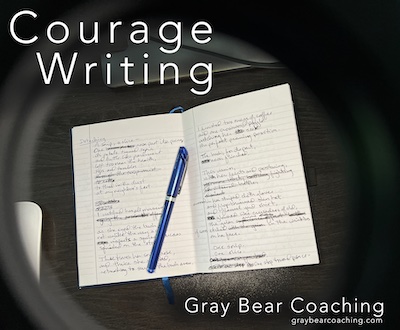 journal with a handwritten poem and a pen lying across the pages, with Courage Writing and Gray Bear Coaching branding