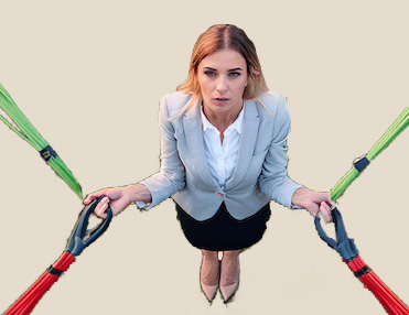 Woman stressed out about decision making because she's holding four bungee cords, each pulling her in a different direction